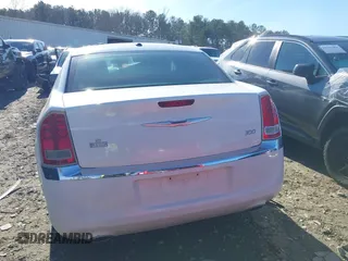 2013 Chrysler 300 with VIN 2C3CCAAG0DH657568, listed as a IAAI auction lot 41319665 with 213,034 mi miles. Bid and sale history available at carsss.com. Image 16.