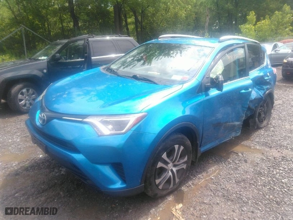 2016 Toyota RAV4 LE with VIN JTMBFREV8GJ102148, listed as a IAAI auction lot 39885095 with 131,835 mi miles. Bid and sale history available at carsss.com. Image 2.