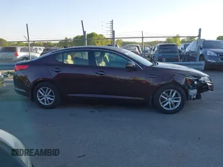 2013 Kia Optima LX with VIN 5XXGM4A71DG124725, listed as a IAAI auction lot 42041768 with 184,181 mi miles and . Bid and sale history available at carsss.com. Image 13.