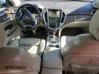 2014 Cadillac SRX Premium Collection z VIN 3GYFNGE31ES615593, wystawiony jako Copart lot #56785775 z przebiegiem 247 230 mil mil oraz Tytuł czysty. Historia ofert i sprzedaży dostępna na DreamBid. Obrazek 8.