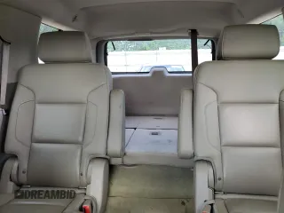 2016 Chevrolet Tahoe LTZ z VIN 1GNSKCKC4GR208861, wystawiony jako Copart lot #56832895 z przebiegiem 132 982 mil mil oraz Szkoda całkowita • Salvage title. Historia ofert i sprzedaży dostępna na DreamBid. Obrazek 11.