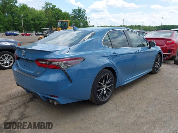 2023 Toyota Camry SE z VIN 4T1T11AK0PU115695, wystawiony jako IAAI lot #42221720 z przebiegiem 67 575 mil mil oraz . Historia ofert i sprzedaży dostępna na DreamBid. Obrazek 4.
