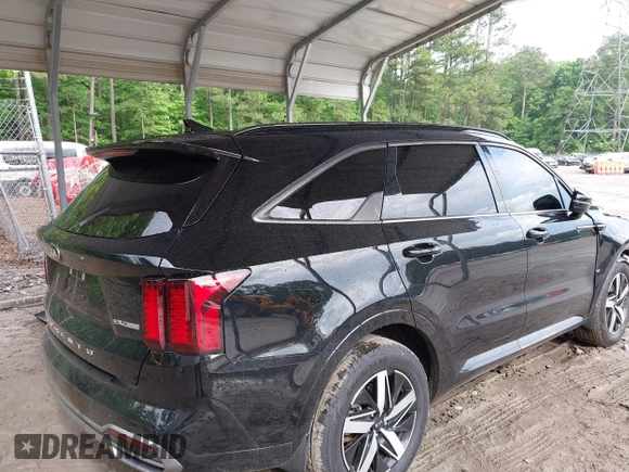 2021 Kia Sorento EX with VIN 5XYRH4LF8MG035053, listed as a IAAI auction lot 42266693 with 62,936 mi miles and . Bid and sale history available at DreamBid. Image 4.