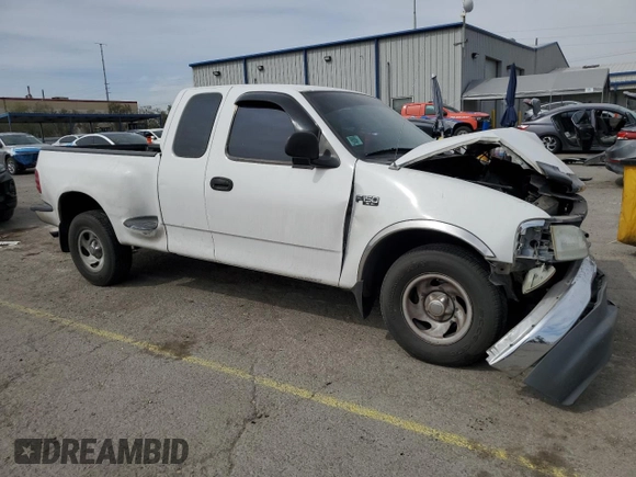 1999 Ford F-150 XL with VIN 1FTZX0721XKA49751, listed as a Copart auction lot 52429195 with Not provided miles and Salvage title. Bid and sale history available at DreamBid. Image 4.
