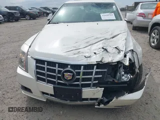 2012 Cadillac CTS Luxury with VIN 1G6DF5E55C0127450, listed as a IAAI auction lot 42020764 with 150,597 mi miles and . Bid and sale history available at DreamBid. Image 6.