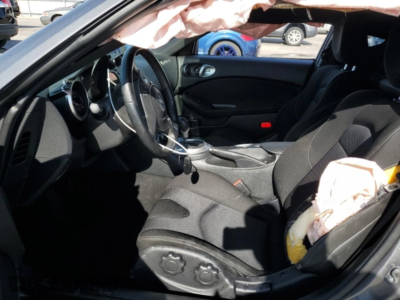 2015 Nissan 370Z with VIN JN1AZ4EH2FM444159, listed as a Copart auction lot 71005944 with 54,063 mi miles and Salvage Title. Bid and sale history available at carsss.com. Image 7.