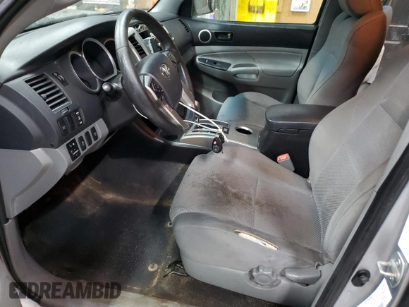 2014 Toyota Tacoma with VIN 5TFMU4FN8EX019541, listed as a Copart auction lot 55295645 with 206,725 mi miles and Clean title. Bid and sale history available at DreamBid. Image 7.