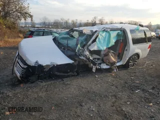 2017 Lincoln Navigator Select z VIN 5LMJJ3JT7HEL04879, wystawiony jako Copart lot #76811424 z przebiegiem Nie podano mil oraz Szkoda całkowita • Salvage title. Historia ofert i sprzedaży dostępna na DreamBid. Obrazek 1.