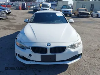 2014 BMW 4 Series 428i with VIN WBA3V7C54EP770552, listed as a IAAI auction lot 41297640 with 114,763 mi miles and . Bid and sale history available at DreamBid. Image 13.