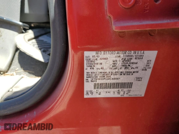 2003 Ford F-350 XL with VIN 1FTWW33P63EC65547, listed as a Copart auction lot 73002754 with 184,482 mi miles and Salvage Title. Bid and sale history available at DreamBid. Image 12.