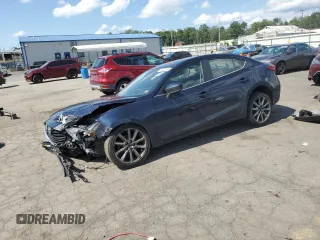 2018 Mazda 3 Touring z VIN 3MZBN1V31JM168860, wystawiony jako Copart lot #61908745 z przebiegiem Nie podano mil oraz Szkoda całkowita • Salvage title. Historia ofert i sprzedaży dostępna na DreamBid. Obrazek 1.