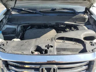 2013 Honda Pilot EX-L with VIN 5FNYF3H6XDB021280, listed as a Copart auction lot 56785535 with 256,649 mi miles and Salvage title. Bid and sale history available at DreamBid. Image 12.