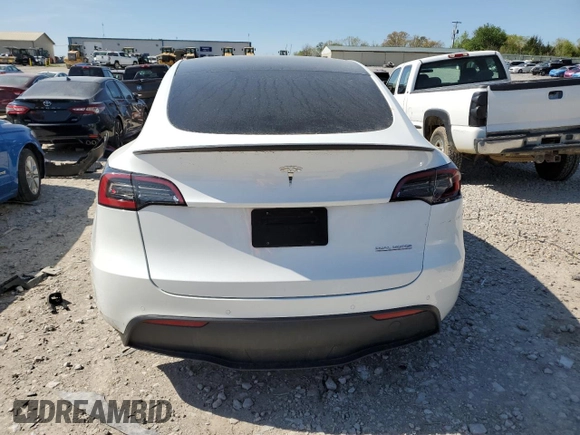 2021 Tesla Model Y Performance with VIN 5YJYGDEF7MF269221, listed as a Copart auction lot 52109785 with 61,619 mi miles and Salvage Title. Bid and sale history available at DreamBid. Image 6.