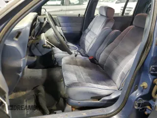 1991 Dodge Spirit z VIN 1B3XA46K9MF628235, wystawiony jako Copart lot #83581274 z przebiegiem 117 774 mil mil oraz Szkody całkowita. Historia ofert i sprzedaży dostępna na DreamBid. Obrazek 7.