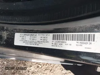 2013 Chrysler 200 LX with VIN 1C3CCBAB7DN568548, listed as a IAAI auction lot 41922392 with 173,255 mi miles. Bid and sale history available at carsss.com. Image 9.