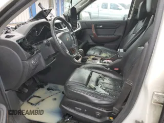 2014 Chevrolet Traverse LTZ z VIN 1GNKVJKD9EJ231164, wystawiony jako Copart lot #52876665 z przebiegiem Nie podano mil oraz Szkoda całkowita • Salvage title. Historia ofert i sprzedaży dostępna na DreamBid. Obrazek 7.