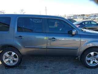 2015 Honda Pilot EX-L with VIN 5FNYF4H57FB063115, listed as a IAAI auction lot 41248234 with 187,752 mi miles and . Bid and sale history available at carsss.com. Image 13.