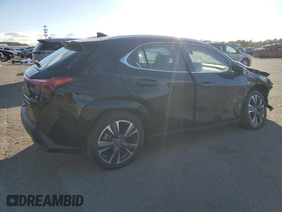 2023 Lexus UX 250h Premium с VIN JTHP9JBH8P2069805, выставлен на аукционе Copart как лот 87671095 с пробегом 12 599 миль миль и Списание • Salvage title. История ставок и продаж доступна на DreamBid. Изображение 3.