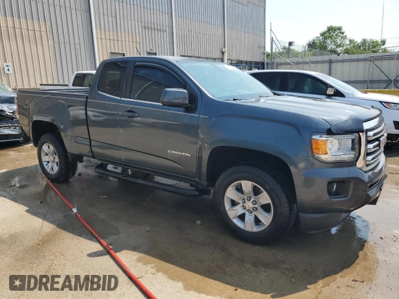 2015 GMC Canyon 2WD SLE with VIN 1GTH5BEA7F1147162, listed as a Copart auction lot 58018514 with 68,014 mi miles and Salvage Title. Bid and sale history available at carsss.com. Image 4.