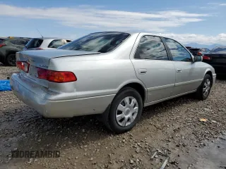 2001 Toyota Camry CE z VIN 4T1BG22K21U058793, wystawiony jako Copart lot #57351245 z przebiegiem 186 095 mil mil oraz Szkoda całkowita • Salvage title. Historia ofert i sprzedaży dostępna na DreamBid. Obrazek 3.