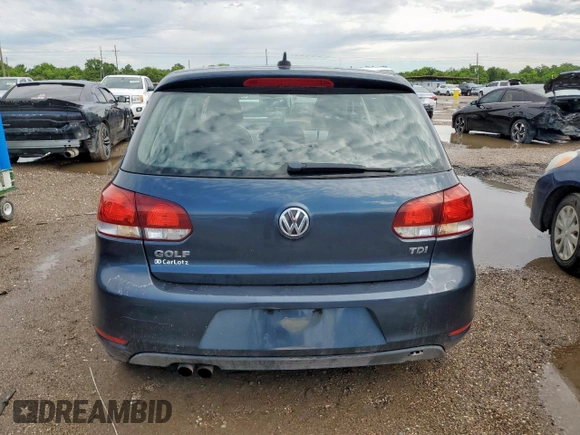 2014 Volkswagen Golf TDI w/Sunroof & Nav z VIN WVWDM7AJ2EW000544, wystawiony jako Copart lot #59343995 z przebiegiem 128 421 mil mil oraz Szkoda całkowita • Salvage title. Historia ofert i sprzedaży dostępna na DreamBid. Obrazek 6.