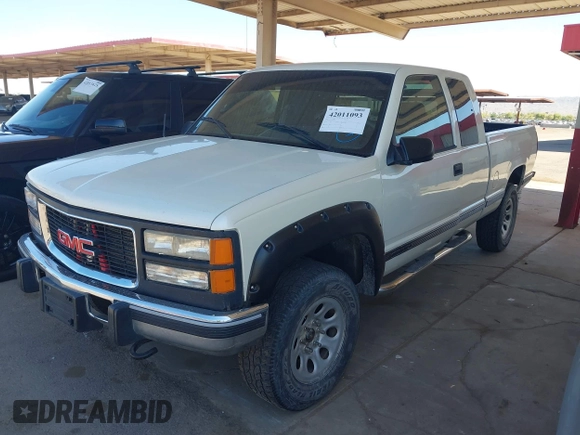 1995 GMC Sierra 1500 z VIN 2GTEK19K9S1591415, wystawiony jako IAAI lot #42011093 z przebiegiem 334 476 mil mil oraz . Historia ofert i sprzedaży dostępna na DreamBid. Obrazek 2.