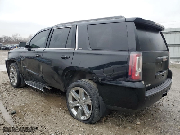2016 GMC Yukon SLT with VIN 1GKS2BKC5GR273449, listed as a Copart auction lot 58732992 with 111,248 mi miles and Salvage Title. Bid and sale history available at carsss.com. Image 3.