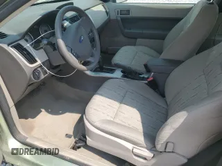 2008 Ford Focus SE z VIN 1FAHP33NX8W141079, wystawiony jako Copart lot #59759325 z przebiegiem 71 522 mil mil oraz Szkoda całkowita • Salvage title. Historia ofert i sprzedaży dostępna na DreamBid. Obrazek 7.