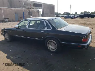 1996 Jaguar XJ with VIN SAJKX6747TC764559, listed as a Copart auction lot 48501775 with Not provided miles and Salvage title. Bid and sale history available at DreamBid. Image 2.