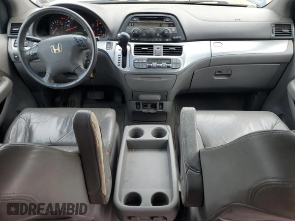 2010 Honda Odyssey EX-L с VIN 5FNRL3H69AB095024, выставлен на аукционе Copart как лот 60102325 с пробегом 235 979 миль миль и Чистый • Clean title. История ставок и продаж доступна на DreamBid. Изображение 8.