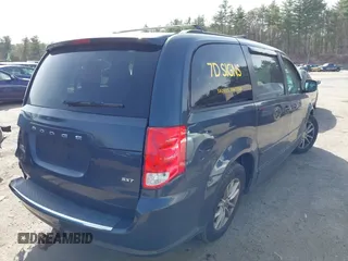 2014 Dodge Grand Caravan SXT with VIN 2C4RDGCGXER109690, listed as a IAAI auction lot 42133337 with 109,332 mi miles and . Bid and sale history available at DreamBid. Image 4.
