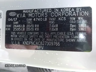 2018 Kia Sportage EX z VIN KNDPNCAC8J7309766, wystawiony jako IAAI lot #42219243 z przebiegiem 90 745 mil mil oraz . Historia ofert i sprzedaży dostępna na DreamBid. Obrazek 9.