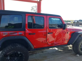 2018 Jeep Wrangler Unlimited Rubicon with VIN 1C4HJXFG0JW159287, listed as a IAAI auction lot 41911012 with 93,784 mi miles and . Bid and sale history available at DreamBid. Image 6.