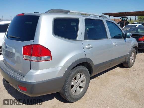 2009 Kia Borrego LX with VIN KNDJJ741695014336, listed as a IAAI auction lot 42079461 with 222,762 mi miles and . Bid and sale history available at DreamBid. Image 4.