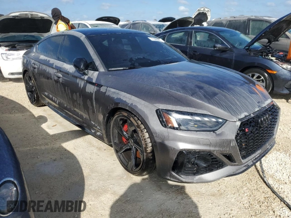 2022 Audi RS 5 Sportback z VIN WUAAWCF57NA901250, wystawiony jako Copart lot #77305584 z przebiegiem Nie podano mil oraz Nie do naprawy. Historia ofert i sprzedaży dostępna na DreamBid. Obrazek 4.
