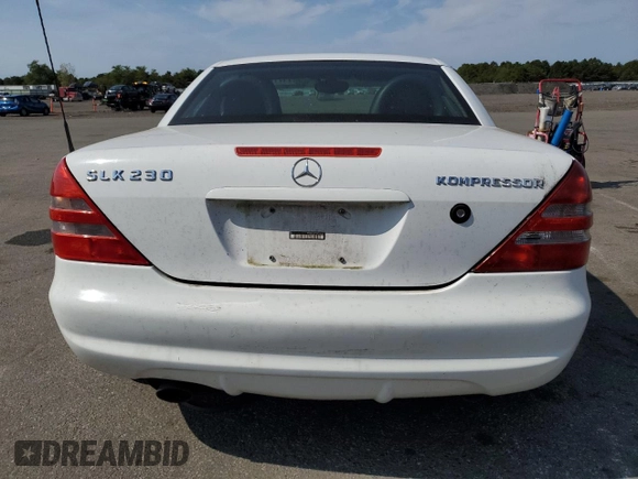 1999 Mercedes-Benz SLK-Class with VIN WDBKK47F9XF130501, listed as a Copart auction lot 71770824 with 124,669 mi miles and Clean Title. Bid and sale history available at carsss.com. Image 6.