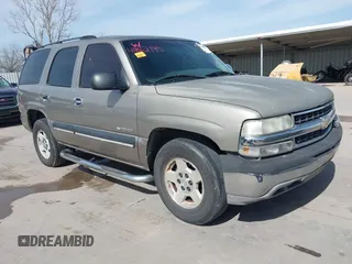 2003 Chevrolet Tahoe LS with VIN 1GNEC13V23R141539, listed as a IAAI auction lot 41812195 with 486,815 mi miles. Bid and sale history available at carsss.com. Image 1.