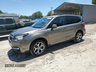 2017 Subaru Forester Touring z VIN JF2SJAWC1HH439090, wystawiony jako Copart lot #58308735 z przebiegiem 58 441 mil mil oraz Szkoda całkowita • Salvage title. Historia ofert i sprzedaży dostępna na DreamBid. Obrazek 1.