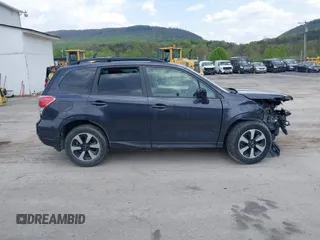 2018 Subaru Forester z VIN JF2SJABC9JH606789, wystawiony jako IAAI lot #42143762 z przebiegiem 70 695 mil mil oraz . Historia ofert i sprzedaży dostępna na DreamBid. Obrazek 14.