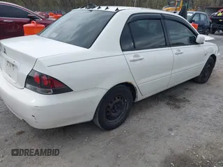 2005 Mitsubishi Lancer ES with VIN JA3AJ26E15U011460, listed as a IAAI auction lot 41955427 with 343,559 mi miles. Bid and sale history available at carsss.com. Image 4.