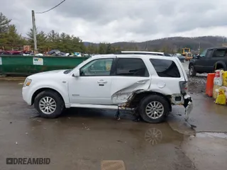 2008 Mercury Mariner Premier with VIN 4M2CU97188KJ29232, listed as a IAAI auction lot 41673352 with 152,727 mi miles. Bid and sale history available at carsss.com. Image 14.