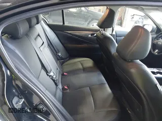 2015 Infiniti Q50 Premium z VIN JN1BV7AR9FM423471, wystawiony jako IAAI lot #42641857 z przebiegiem 86 919 mil mil oraz . Historia ofert i sprzedaży dostępna na DreamBid. Obrazek 8.