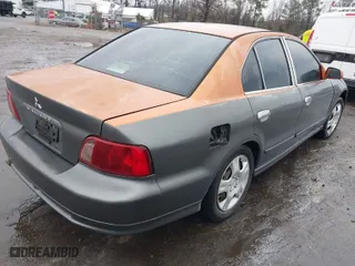 2003 Mitsubishi Galant ES with VIN 4A3AA46G83E136877, listed as a IAAI auction lot 41469411 with 307,492 mi miles. Bid and sale history available at carsss.com. Image 4.