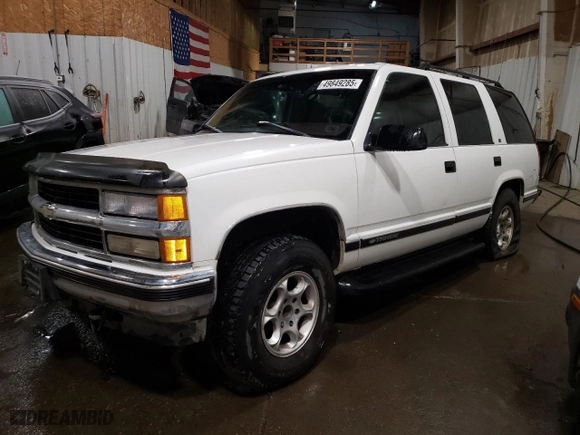 1999 Chevrolet Tahoe Z71 with VIN 1GNEK13R4XJ356365, listed as a Copart auction lot 49849285 with 187,701 mi miles and Salvage Title. Bid and sale history available at carsss.com. Image 1.