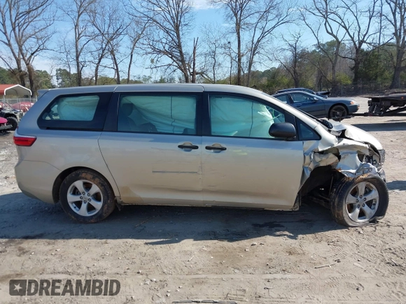 2015 Toyota Sienna L with VIN 5TDZK3DC4FS669496, listed as a IAAI auction lot 41691430 with 119,427 mi miles and . Bid and sale history available at DreamBid. Image 14.