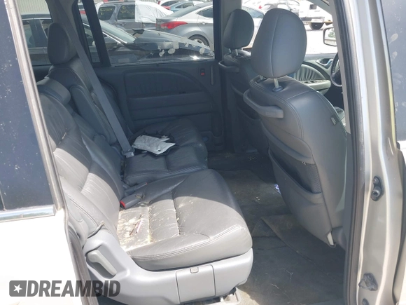 2007 Honda Odyssey EX-L z VIN 5FNRL38797B042602, wystawiony jako IAAI lot #42300656 z przebiegiem 250 000 mil mil oraz . Historia ofert i sprzedaży dostępna na DreamBid. Obrazek 8.
