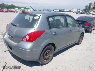 2008 Nissan Versa 1.8 S with VIN 3N1BC13E08L406990, listed as a IAAI auction lot 42080031 with 175,008 mi miles. Bid and sale history available at carsss.com. Image 4.