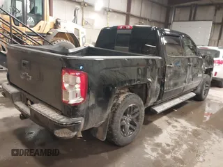 2016 Chevrolet Silverado 1500 LTZ with VIN 3GCUKSEC2GG263493, listed as a IAAI auction lot 41199166 with 143,543 mi miles. Bid and sale history available at carsss.com. Image 4.