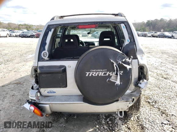 2004 Chevrolet Tracker LT z VIN 2CNBE634346901609, wystawiony jako Copart lot #86977504 z przebiegiem 59 089 mil mil oraz Szkoda całkowita • Salvage title. Historia ofert i sprzedaży dostępna na DreamBid. Obrazek 6.