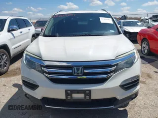 2017 Honda Pilot Touring with VIN 5FNYF6H92HB054145, listed as a IAAI auction lot 42200391 with 70,096 mi miles and . Bid and sale history available at DreamBid. Image 12.
